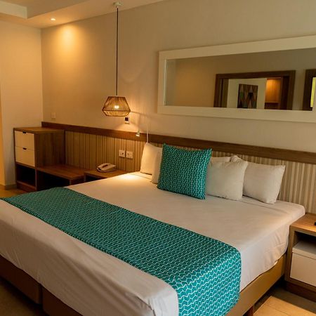 Bahia Principe Grand Punta Cana Exterior foto A bedroom at the resort