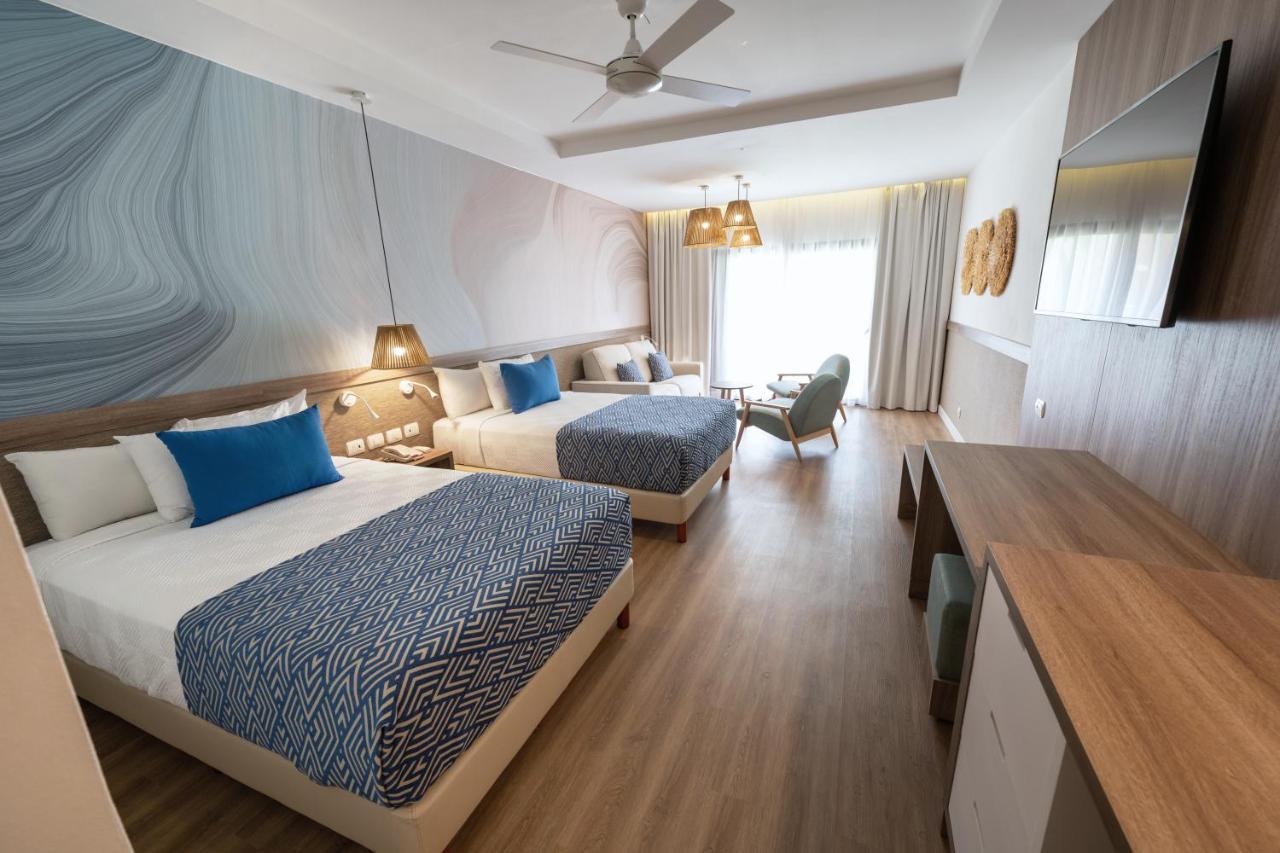 Bahia Principe Grand Punta Cana Exterior foto Family room