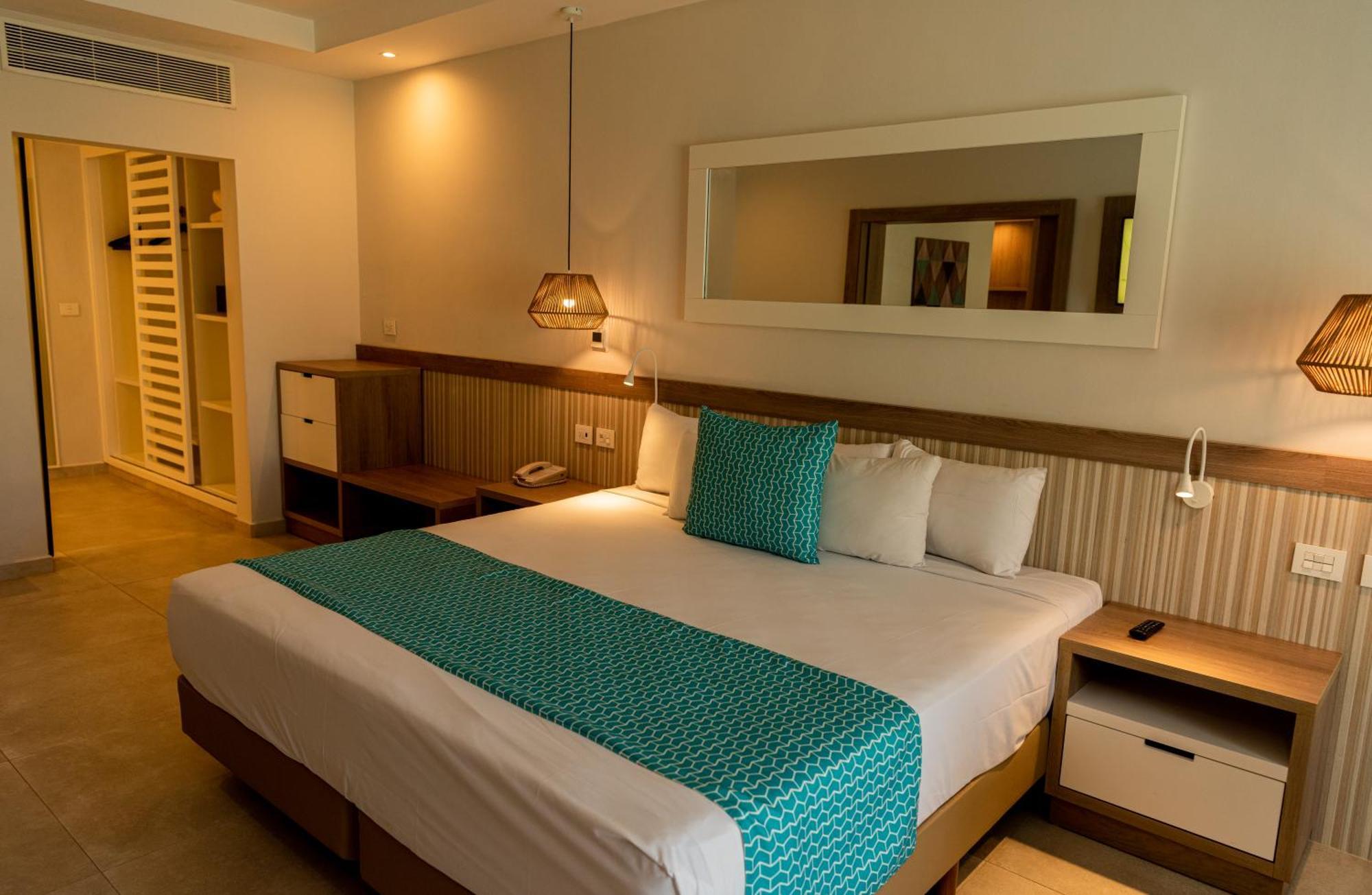 Bahia Principe Grand Punta Cana Exterior foto A bedroom at the resort